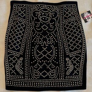 BLACK MINI SKIRT WITH GOLD STUDS